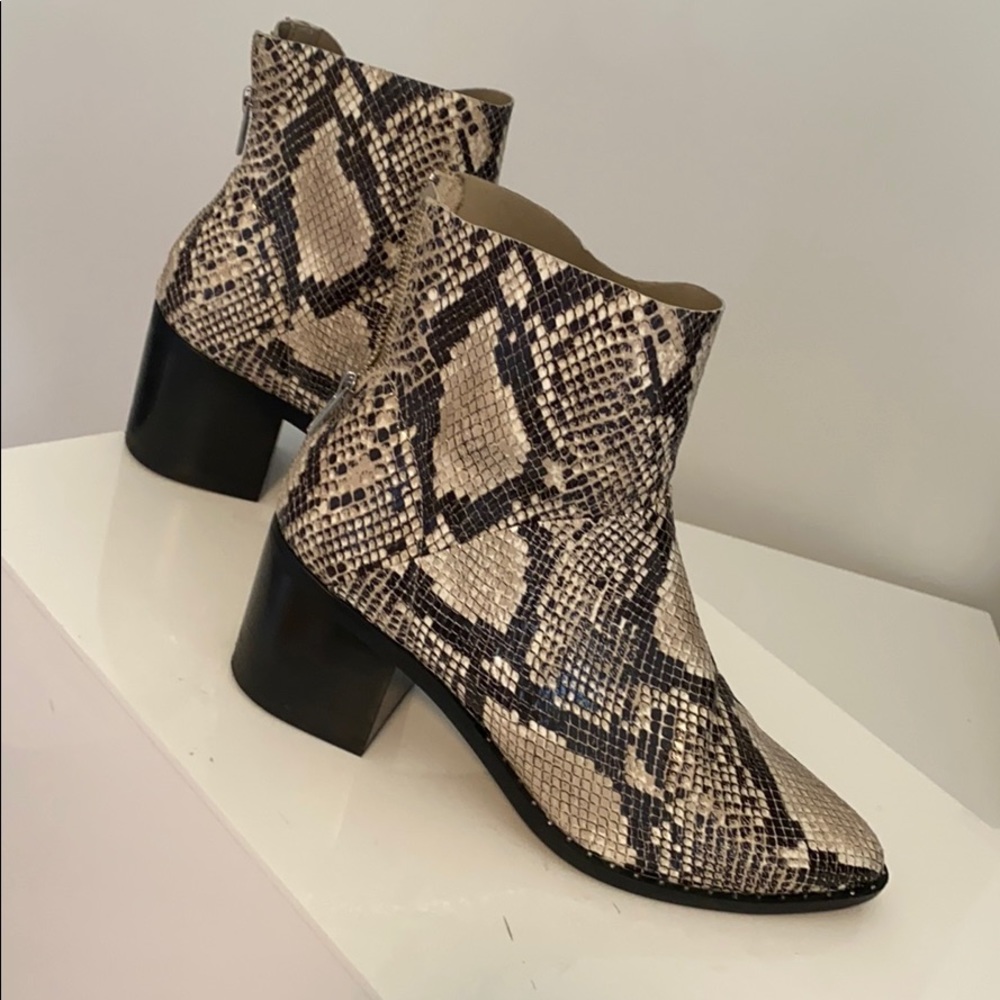 Newish boots snakeskin print size 10